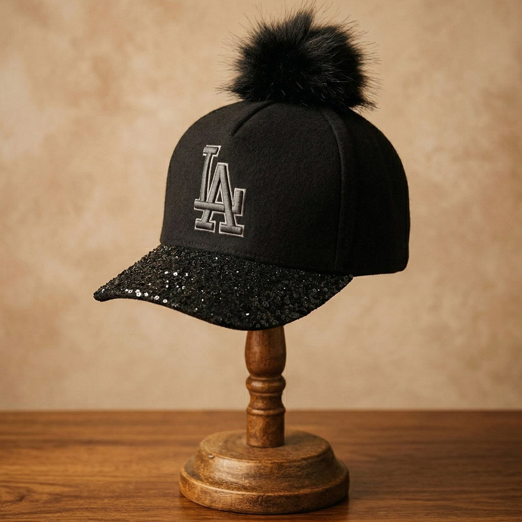 Women wearing stylish winter headwear with embroidered logo