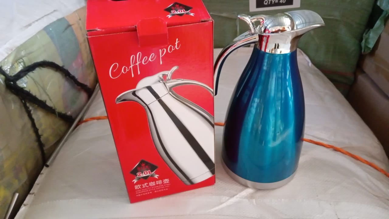 Bottlart stainless steel vacuum insulated kettle jug displayed in a home setting.