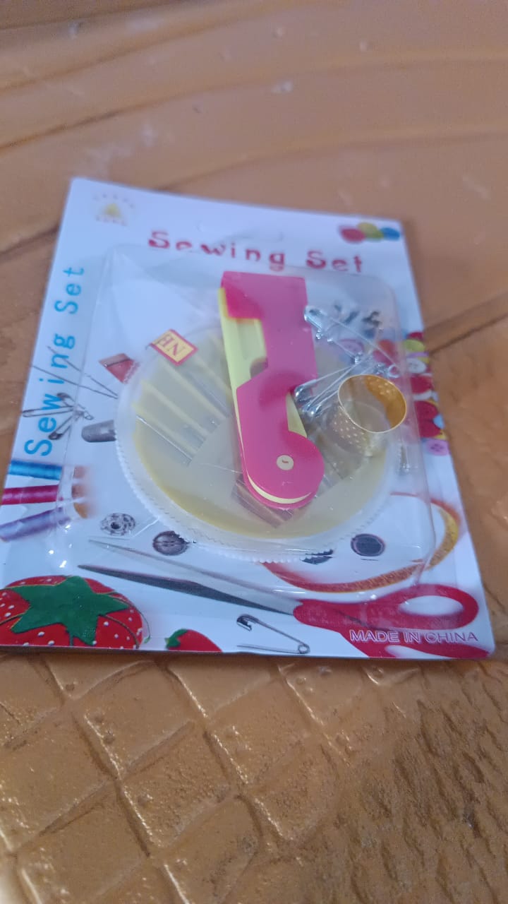 Tailoring sewing kit compactly packed for travelling with essential sewing tools