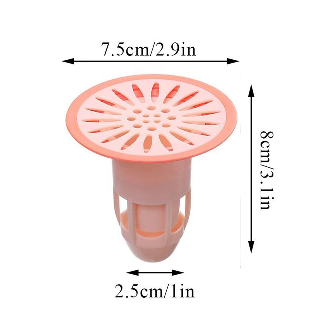 Effective hair trap plug made of silicone, shown in a kitchen sink to prevent food debris.