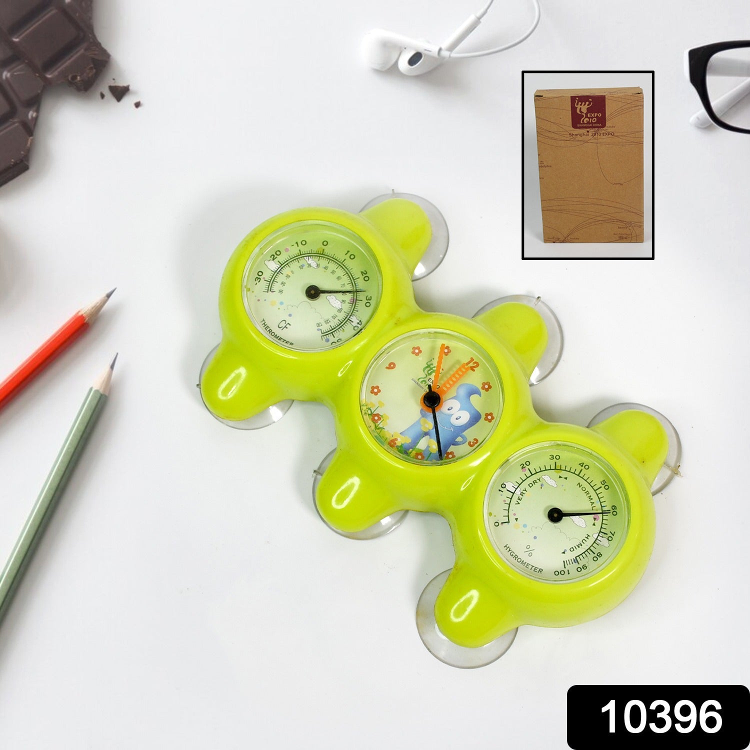 Sleek plastic desktop clock with clear digital display on an office desk setting.