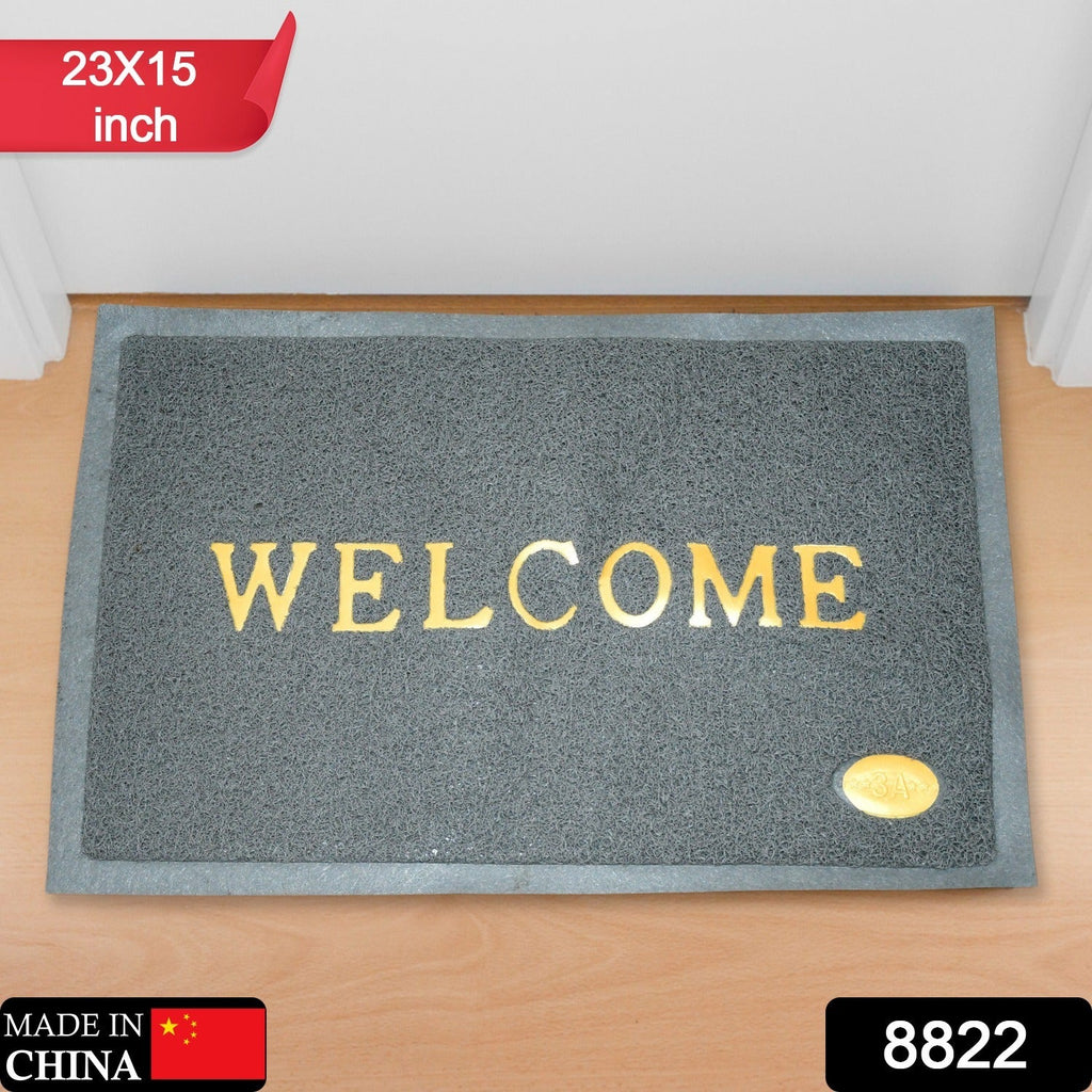 Close-up of the textured surface of the heavy-duty Welcome Door Mat, showing its dirt-trapping ability.