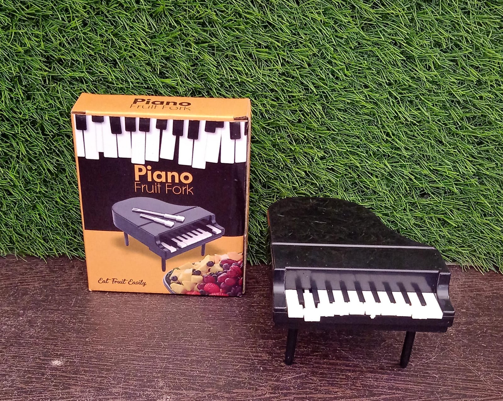 Isolated image of a single piano-themed fork, showcasing the detailed craftsmanship.