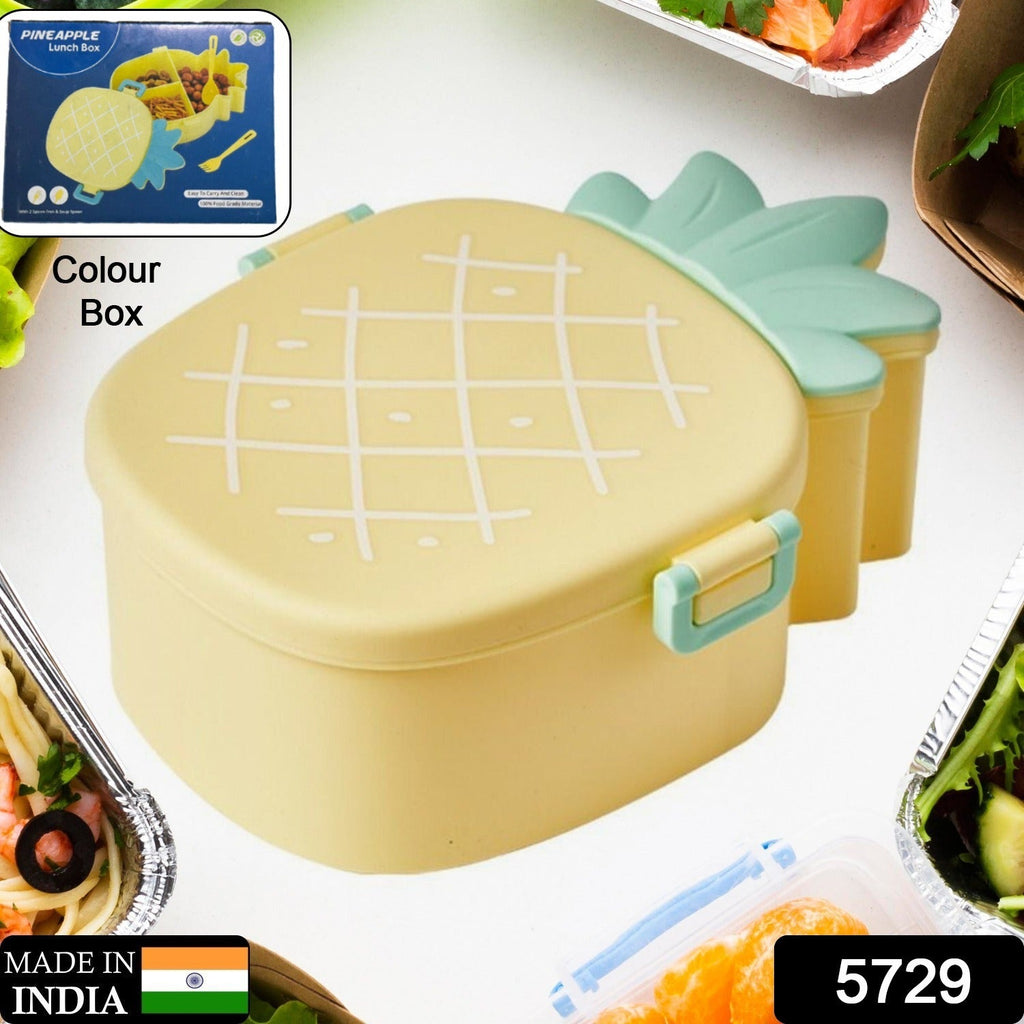 Close-up textured view of the bright yellow pineapple lunchbox lid.