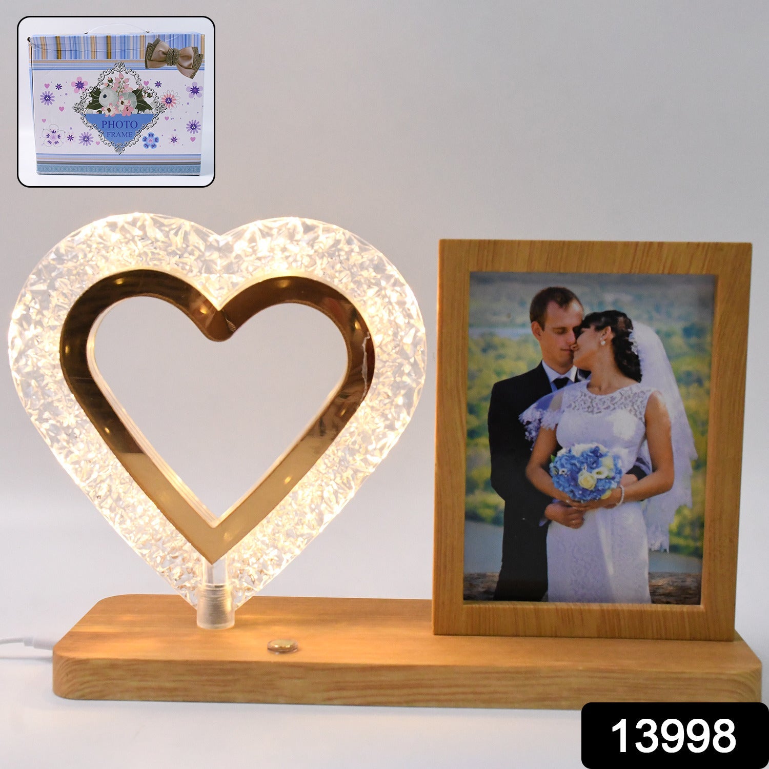 Radiant heart shaped LED lamp showcasing couple's photo