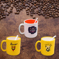 Elegant designer coffee mug with spoon, presented in a gift box.