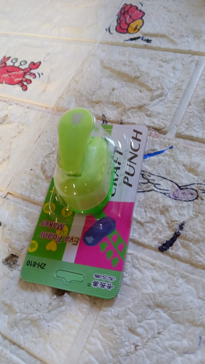 Assorted paper punches for kids' crafting activities, displayed together.
