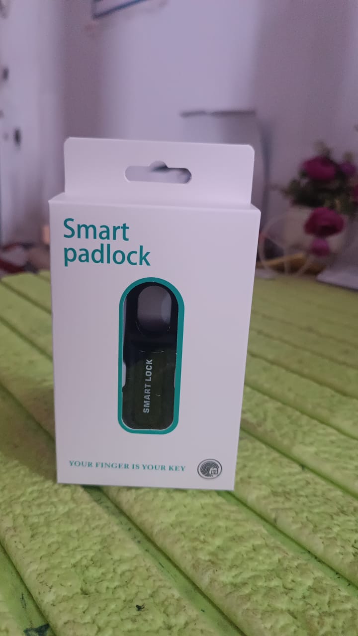 User demonstrating easy fingerprint registration on the Safelix padlock.