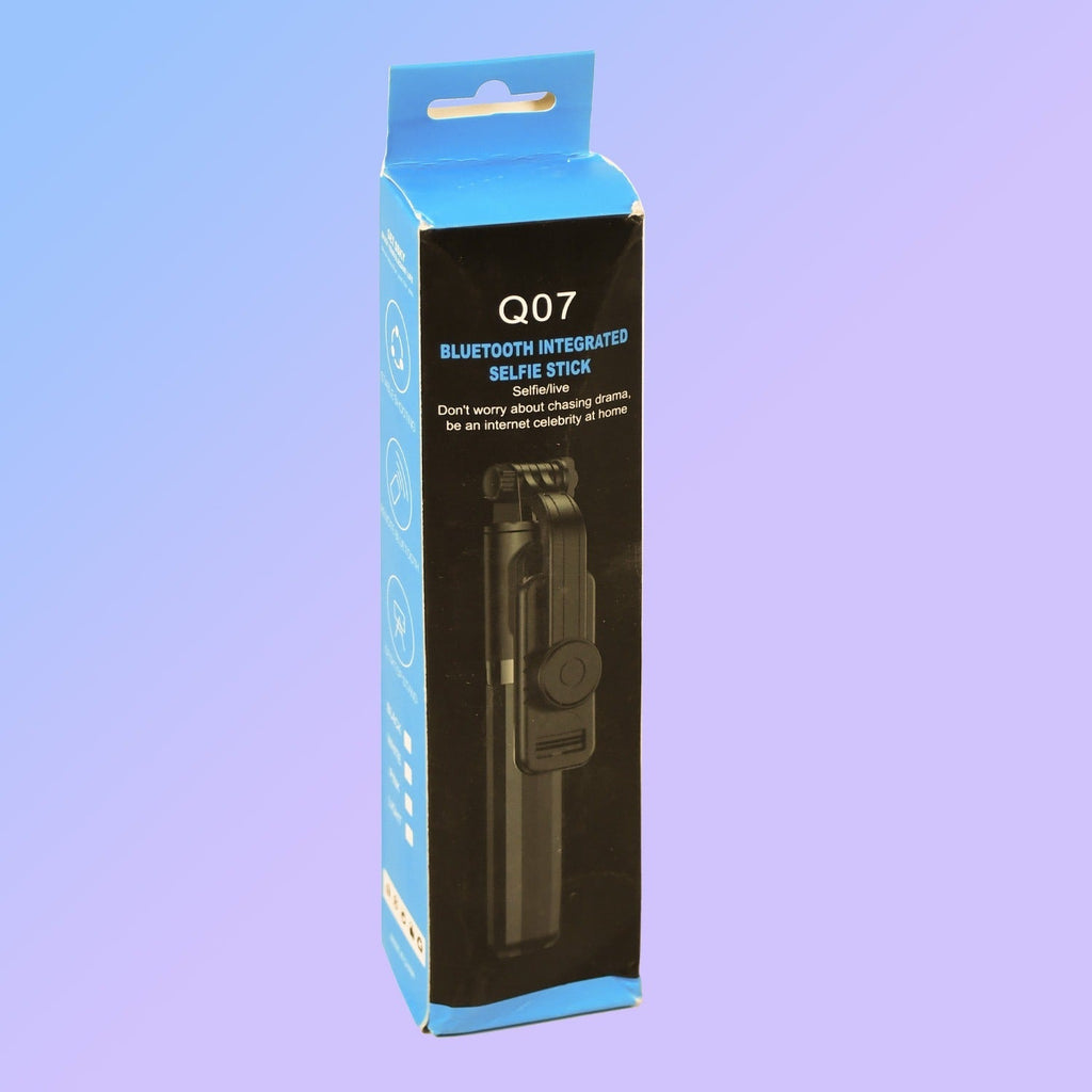 Bluetooth selfie stick extended as a phone tripod for stable shots.