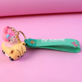 Cartoon character keychain with silicone strap and mini toy charm