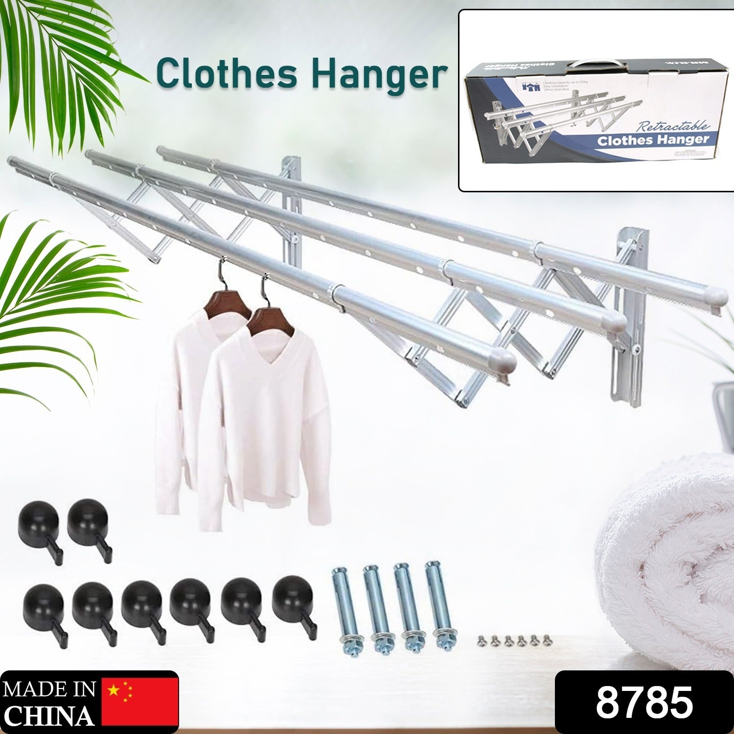 Extended stainless steel drying rack holding towels and clothes, showcasing its capacity.