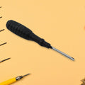 XcelGrip Phillips screwdriver with red and black handle, showing the cross-head tip.
