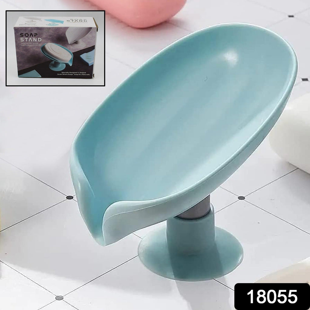 Leaf-shaped self draining soap holder in a modern bathroom setting.