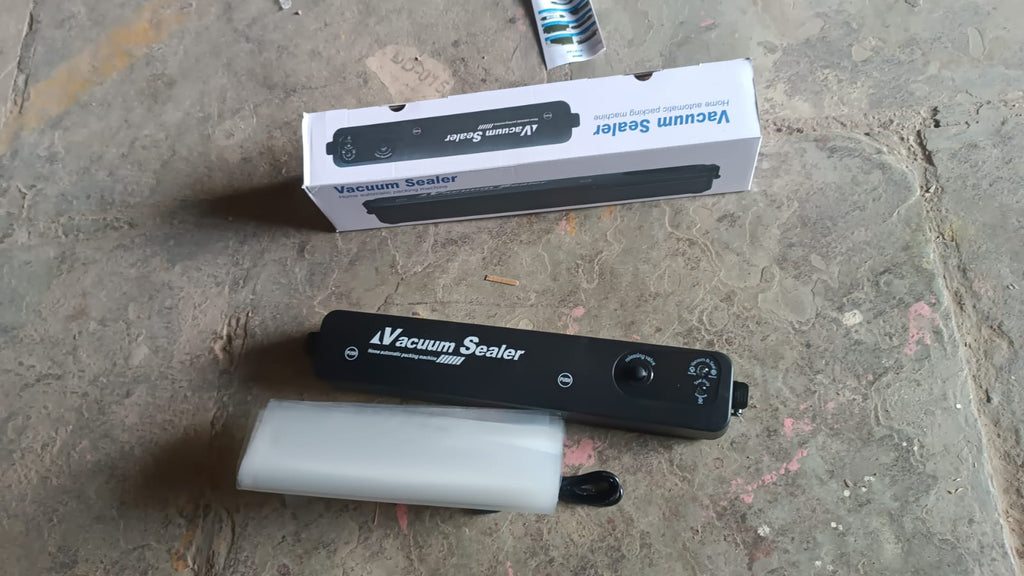 Retail packaging of the Tidy Table Automatic Vacuum Sealer Machine.