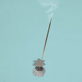 Set of four silver finish wall-mounted agarbatti holders for incense sticks