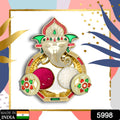 Decorative Puja Thali with small kumkum holders, ideal for festive celebrations.