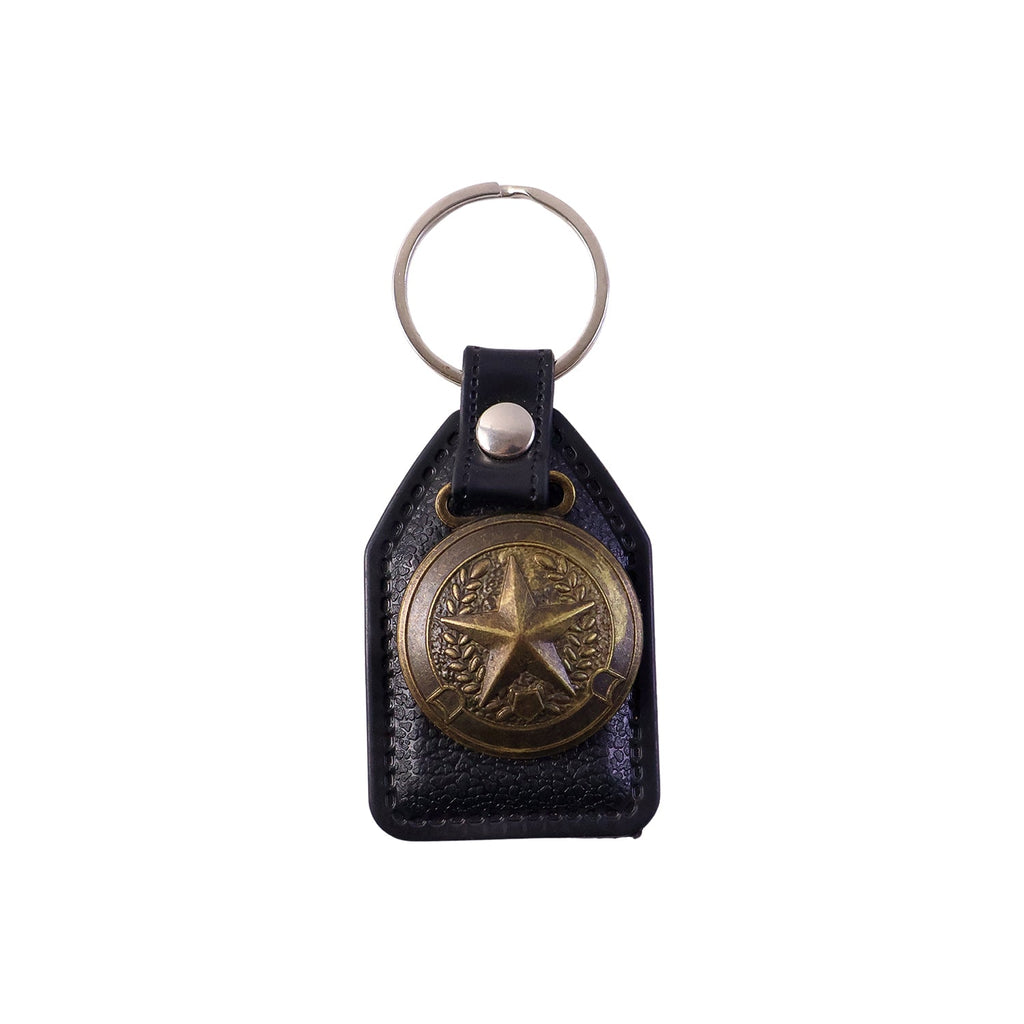 Metal star emblem keychain attached to a keyring for car keys