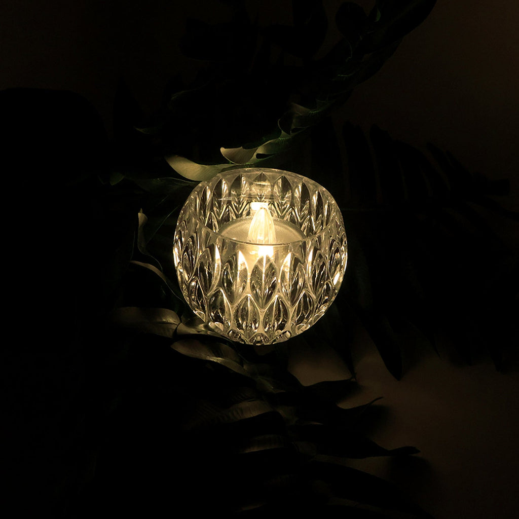 Close-up of crystal style LED decorative lamp showing diamond-cut design