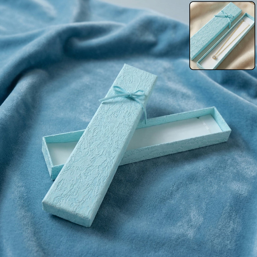 Premium long jewelry gift box closed with ribbon for gifting
