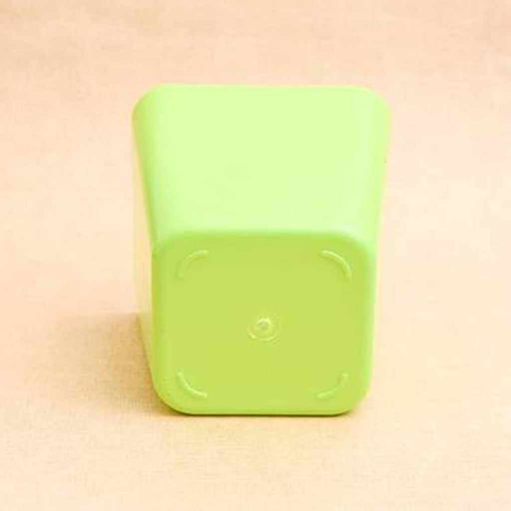 Modern square plastic planter ideal for various indoor plant setups.