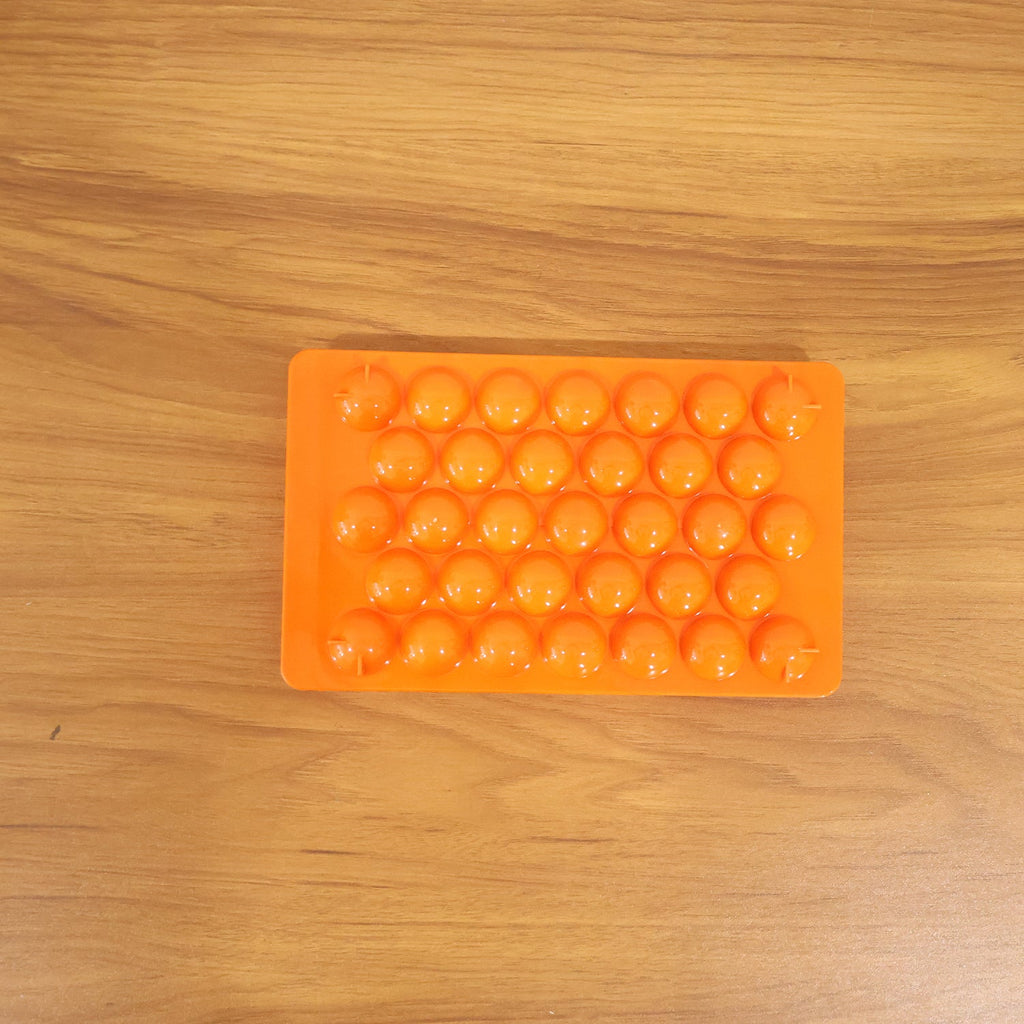 Kitchen candy making mold in orange