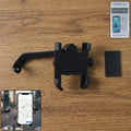 A sturdy metal bike phone holder securely mounted on a motorcycle's rear view mirror, ready for navigation.