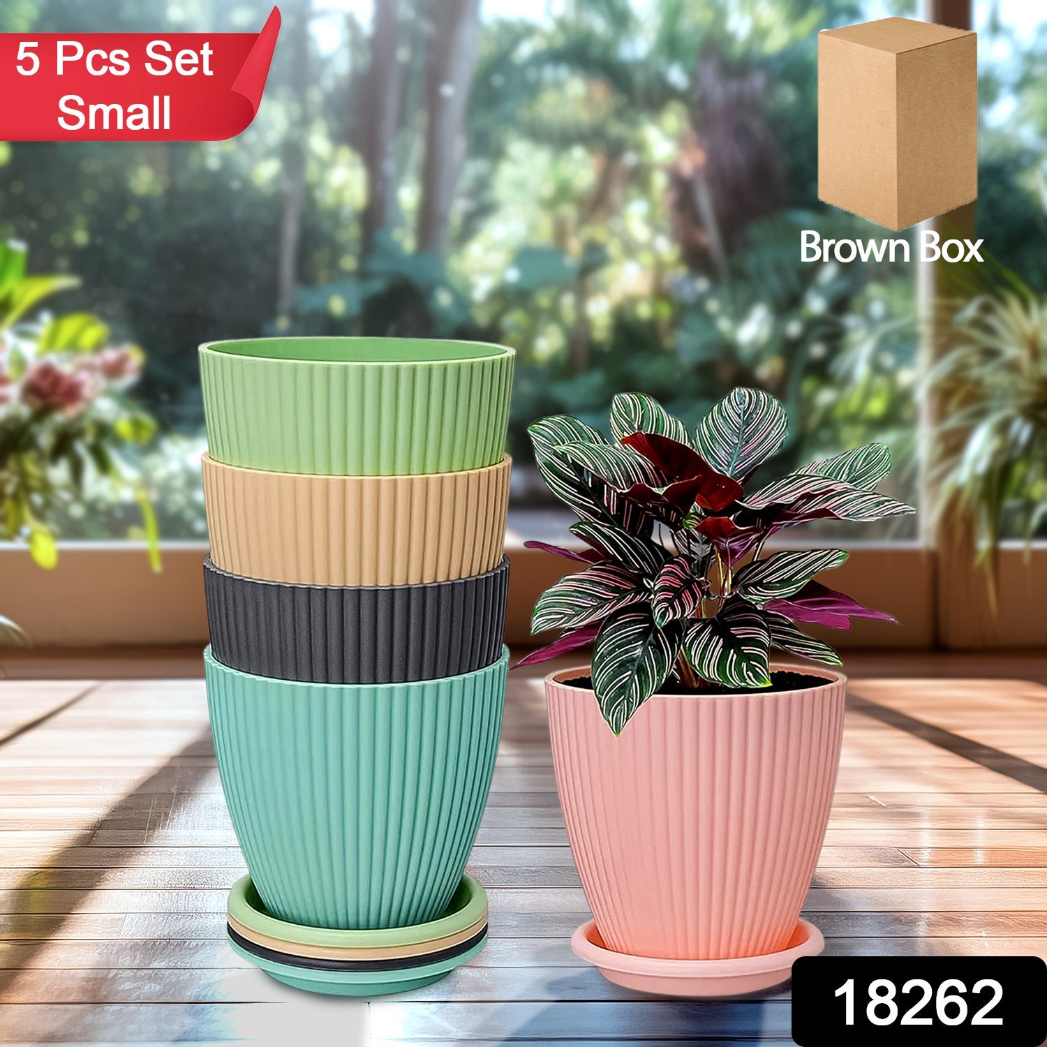 Set of five round plastic flower pots in various colors with matching trays.